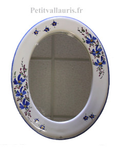 Miroir en faïence de forme ovale avec petites fleurs et décor artisanal fleuri bleu