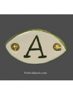Médaillon céramique ovale bord et inscription verte