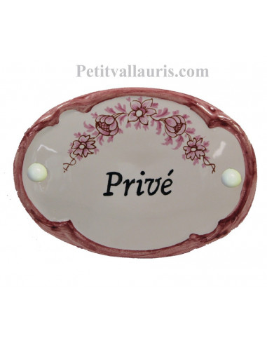 Plaque ovale de porte en faience blanche avec inscription Privé décor fleurs reproduction vieux moustiers rose